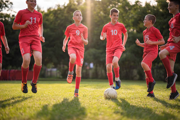 istock Soccer kids team 1095105958
