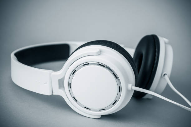 istock white headphones on black and white 1095109360