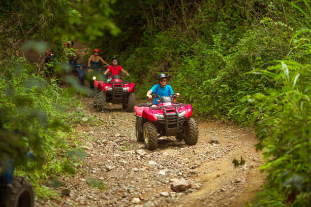 Driving 4x4 in Costa Rica Driving 4x4 in Costa Rica off road vehicle photos stock pictures, royalty-free photos & images