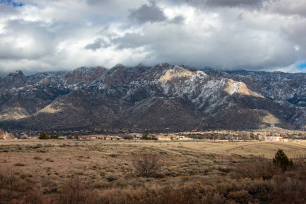 istock Sandia Mountains with Majestic Sky and Clouds 1095118012