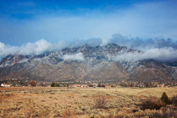 istock Sandia Mountains with Majestic Sky and Clouds 1095118412
