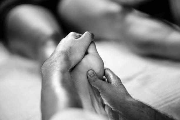 istock Cropped Hands Giving Toe Massage To Customer 1095130720