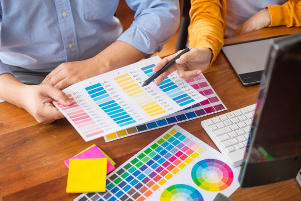 istock Colleagues Analyzing Color Swatch In Office 1095131300