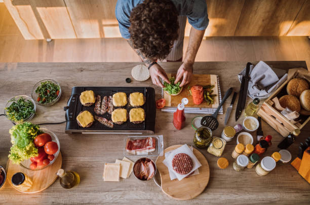 istock Finishing Up Delicious Cheeseburgers 1095131674
