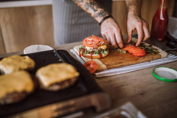 istock Finishing Up Delicious Cheeseburgers 1095131754
