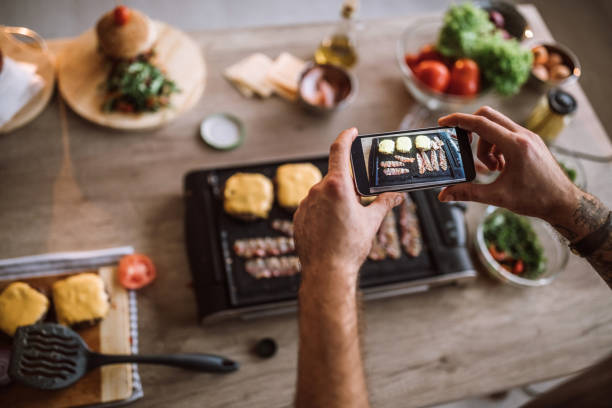istock Taking Photos of Food Preparation Using Phone 1095137770