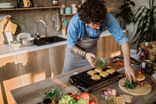 istock Decorating Tasty Hamburgers 1095137776