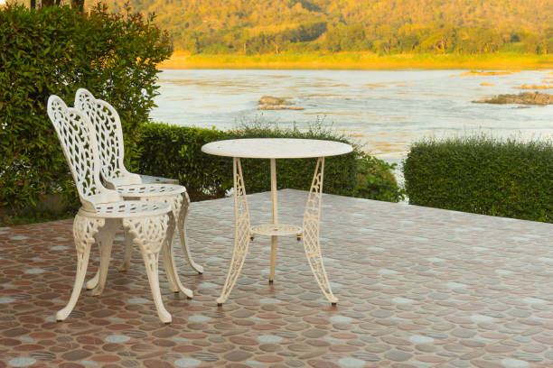 istock White chairs and table at the terrace with lake view. 1095140758