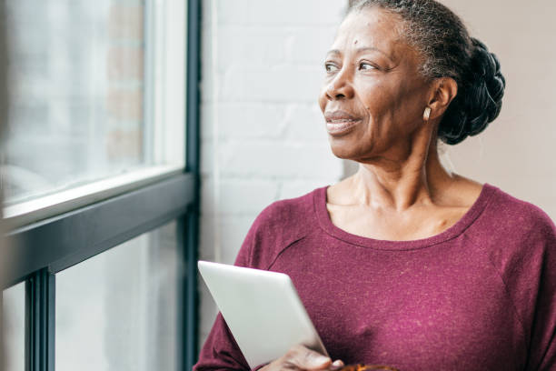 istock Senior women at home using tablet 1095145422
