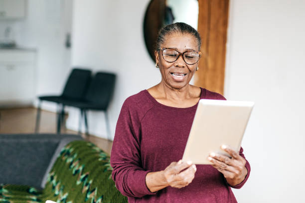 istock Senior women at home using tablet 1095145430