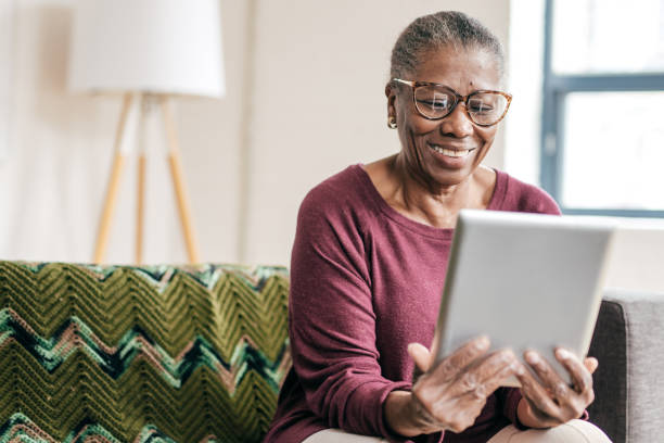 istock Senior women at home using tablet 1095145506