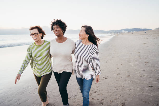 istock Active seniors enjoying time together on the beach 1095146384
