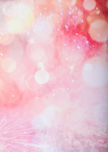 Soft pink light abstract bokeh background with sparkling white stars. Trendy colors. Vertical.