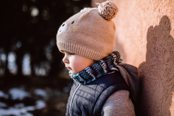 istock Cute Baby Boy On Sunny Winter Day 1095149978
