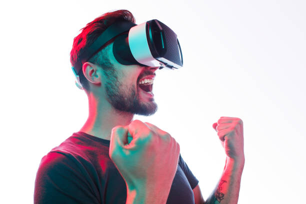 istock Happy man in VR glasses celebrate win 1095150138