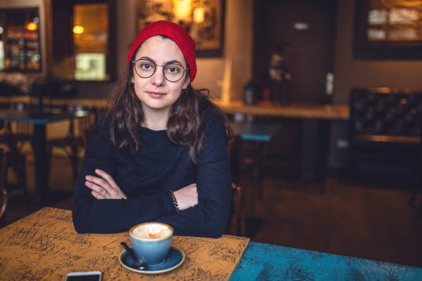 istock Beautiful hipster girl at a coffee shop 1095152000