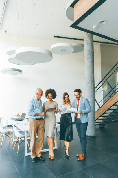 istock Successful business people standing in the office 1095152026