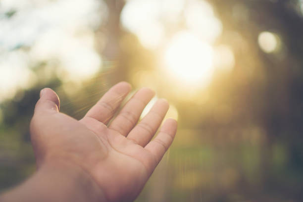 istock Close-Up Of Hand Against Sky 1095153000