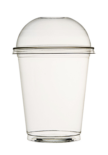 Transparent plastic cup for smoothies and cocktails, with a lid, isolated on a white background. Front view.
