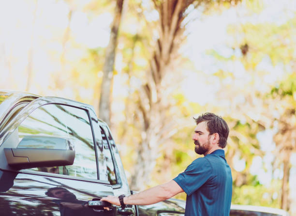 istock Handsome bearded getting into his truck 1095159840