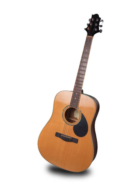 istock Wood floors, old rusty instruments shadow guitar clipingpart 1095162782