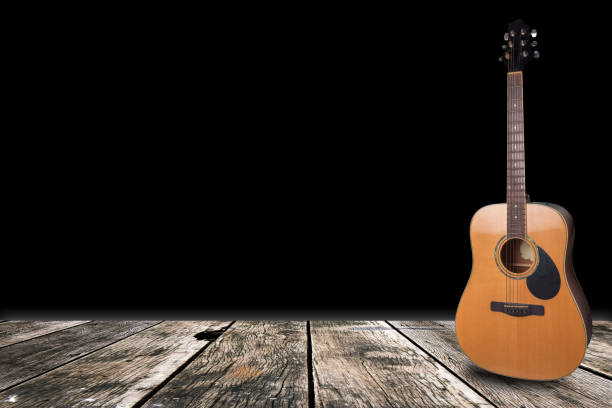 istock Wood floors, old rusty instruments shadow guitar clipingpart 1095162800
