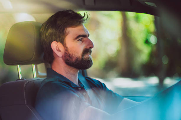 istock Handsome bearded man driving a vehicle 1095162874