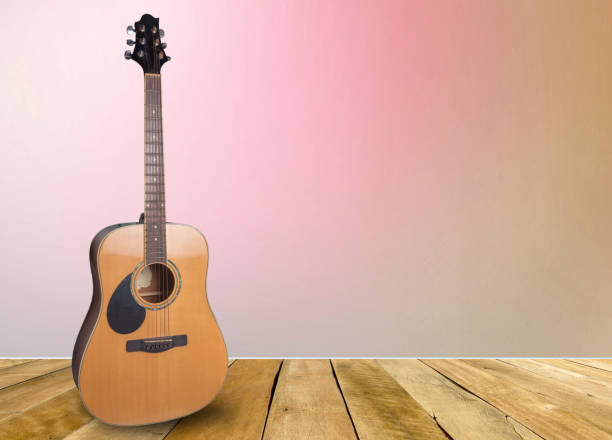 istock Wood floors, old rusty instruments shadow guitar clipingpart 1095168412