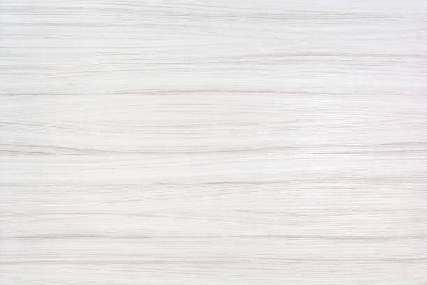 White wood texture White wood background. A wood grain pattern featuring even grains of wood running horizontally across the image. The board is new and clean. overhead light stock pictures, royalty-free photos & images
