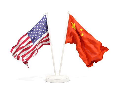 Two waving flags of United States and china isolated on white. 3D illustration