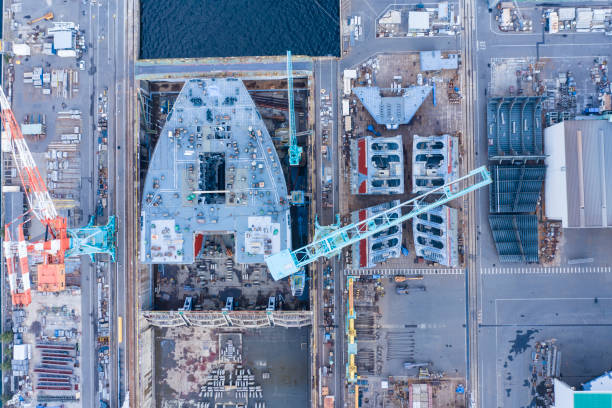 A scenery of a shipyard built on the beachfront