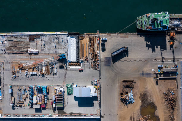 istock Construction company conducting maintenance of port 1095178710