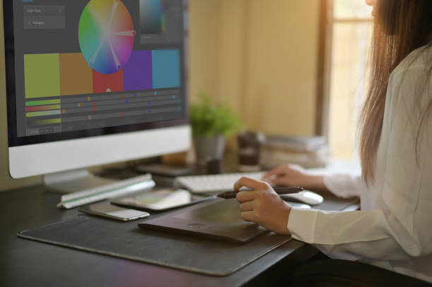 istock Graphic designer job, Woman using digital pen sketch on tablet and working with computer on creative desk. 1095179248