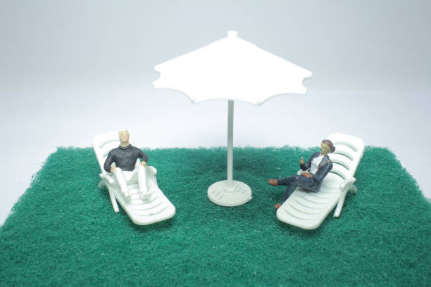 istock a mini of  beach deck chair with figure 1095184162