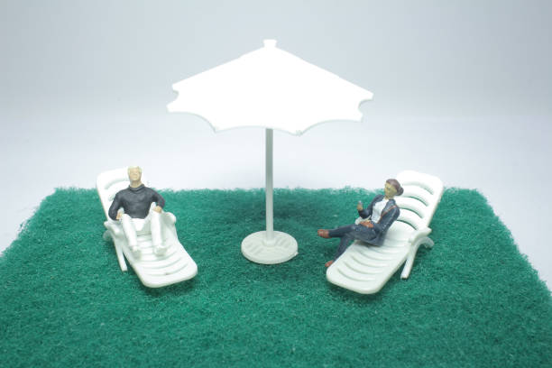 istock a mini of  beach deck chair with figure 1095184174