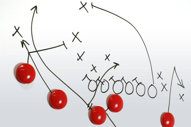 istock Football Strategy Drawing on Whiteboard 1095184266