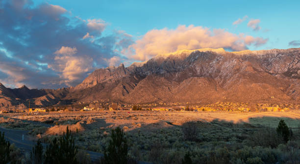 istock Sandia Mountains with Majestic Sky and Clouds at Sunset 1095188826