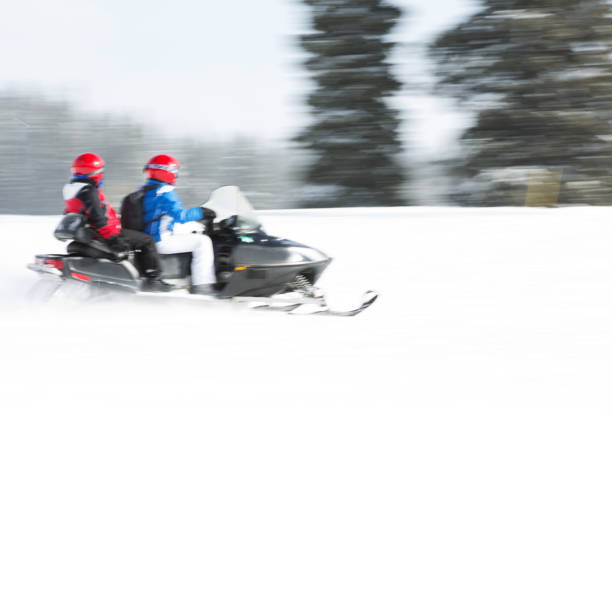 istock Having fun with a snowmobile in the winter 1095192270