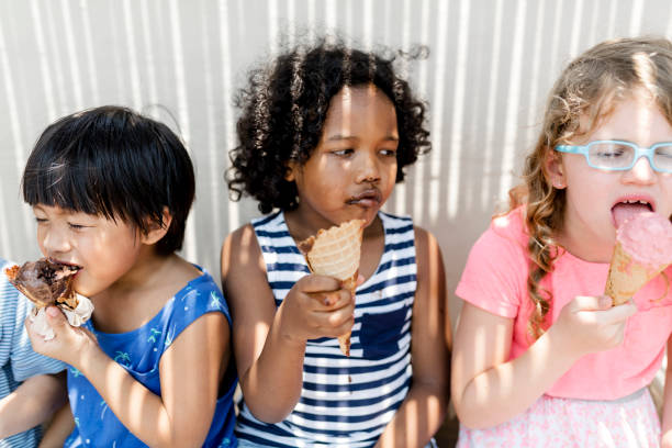 istock Kids eating ice cream in the summer 1095193446
