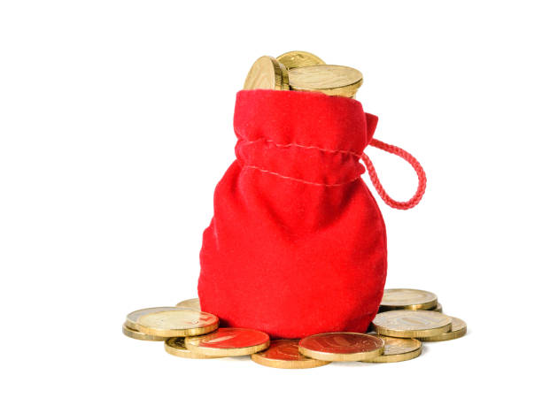 istock Bag of bright red fabric with coins isolated on white background. 1095193888