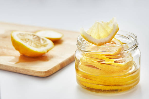 istock lemon with sugar is in a glass jar 1095202348