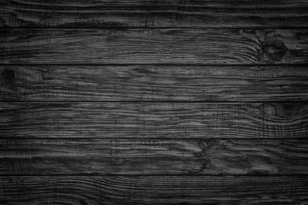 istock dark wood. Rustic wooden table background top view 1095203796
