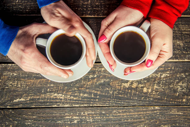istock Cup drink for Breakfast in the hands of lovers. Selective focus. 1095221560