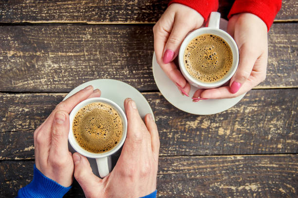 istock Cup drink for Breakfast in the hands of lovers. Selective focus. 1095221566