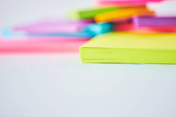 istock Abstract macro shot of a collection of colored sticky notes 1095226956