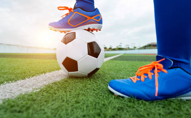 istock Football player feet waiting for kick off 1095227154