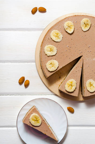 istock Delicious banana cake on table top view. Banana cheesecake. 1095236448