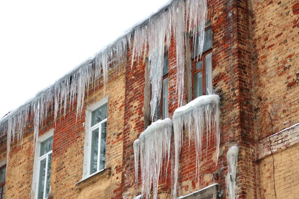 istock Large icicles on the facade of the building 1095236790