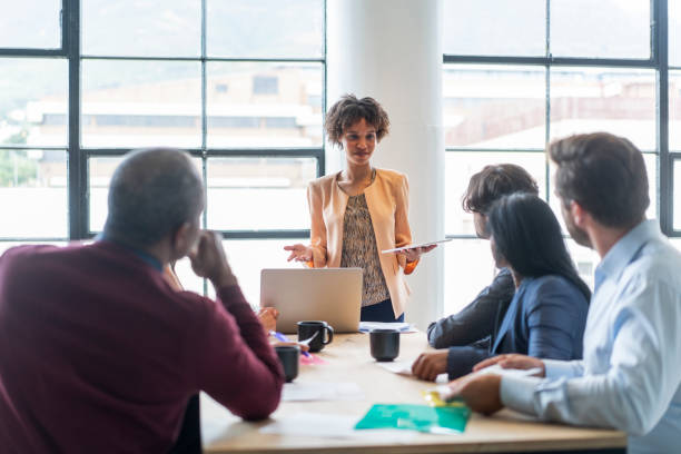 istock Male manager planning with team during meeting 1095237060