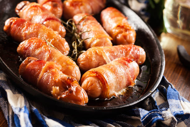 istock Pigs in blankets in baking dish 1095244762